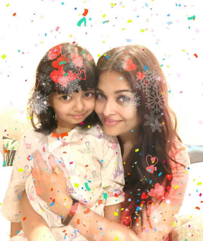 As told by her star mom, Aaradhya Bachchan's upbringing has been very normal and the Bachchan family would like to keep it that way, always. 'She has had a very normal upbringing till now. It's not like we sit her down and show her our films. I can't say she is blissfully unaware, she is aware of what we do. She obviously sees our posters all over the city. She is aware of who we are,' Aishwarya told. In picture: Aishwarya Rai Bachchan with mom Aishwarya Rai Bachchan. Don't they look adorable?
