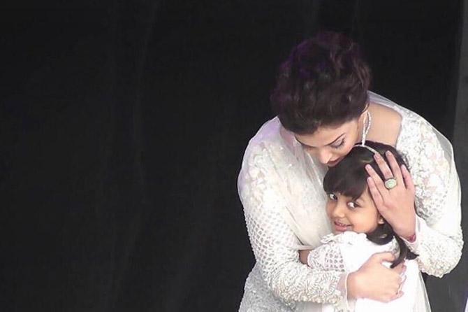 Aishwarya Rai Bachchan lovingly embraces her daughter Aaradhya. This wonderful moment was shared by Abhishek Bachchan on his Instagram account.