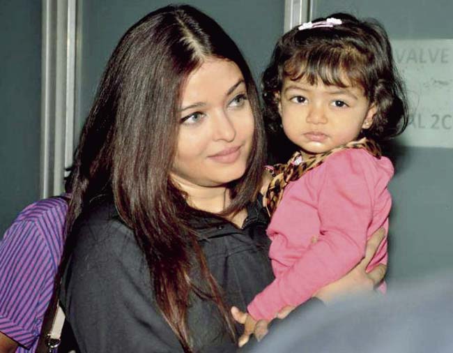 Little Aaradhya Bachchan got used to the paparazzi, right from the time she opened her eyes, according to her mother Aishwarya Rai Bachchan.