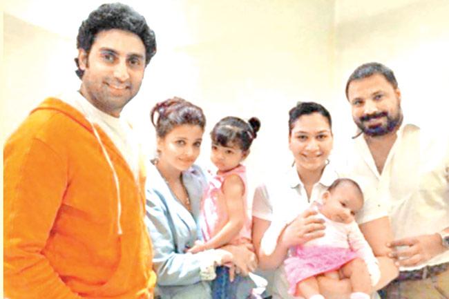 'As far as Aishwarya and I are concerned, be it tomorrow, twenty years down the line or whenever, whatever she decides, we will support her no matter what. That's what our parents did for us as well,' said Abhishek Bachchan. In picture: Abhishek Bachchan and Aishwarya Rai Bachchan with daughter Aaradhya, and Bunty Walia with wife Vanessa Parmar and their daughter Airah.
