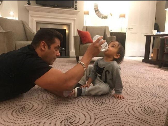 This image of Salman Khan feeding his nephew Ahil Sharma is simply adorable. Salman Khan's sister Arpita Khan Sharma married Aayush Sharma on November 18, 2014, and the duo gave birth to an adorable child, Ahil. The little munchkin is three, and Salman is often spotted sharing pictures of the two on social media.
