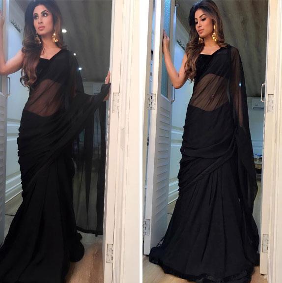 Mouni Roy looks sensuous in this see-through black saree