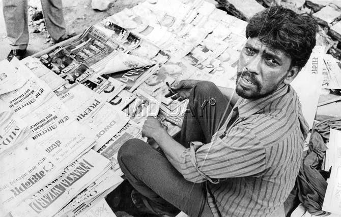 Selling newspapers on the street is a common sight across all cities, and Mumbai is no exception. A newspaper stall is at every railway station, every other place in Mumbai