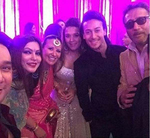 Tiger Shroff pictured with his entire family, dad Jackie, mom Ayesha, sister Krishna and some friends at a wedding. Tiger had once revealed that his father Jackie Shroff does not give him acting tips. 'We hardly discuss films when we are at home. Our discussions are generally on either family or food. He keeps a tab on my work but he doesn't give me any tips,' he said.