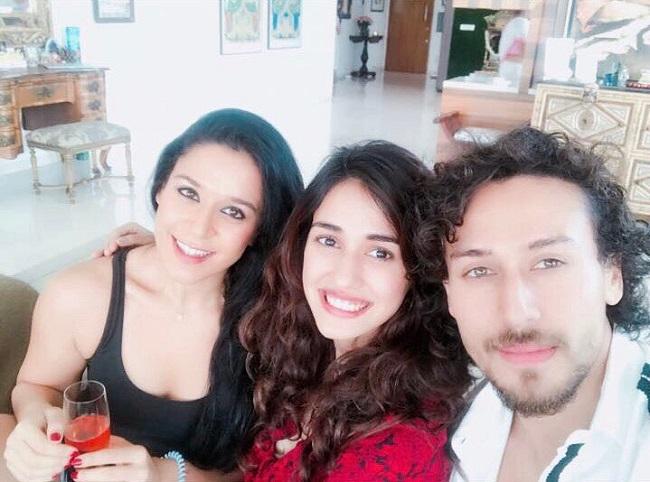 Disha Patani pictured here with Tiger Shroff and Krishna Shroff is also considered a member of the Shroff family. Ayesha Shroff too bonds big time with Disha, and they have been often spotted on lunch outings.
