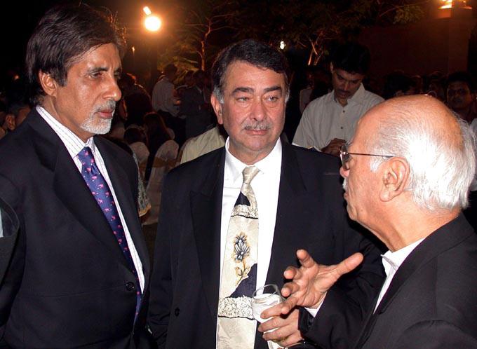 Amitabh Bachchan, Randhir Kapor and Yash Johar captured in a candid moment during the launch of the book 'Raj Kapoor Speaks'
