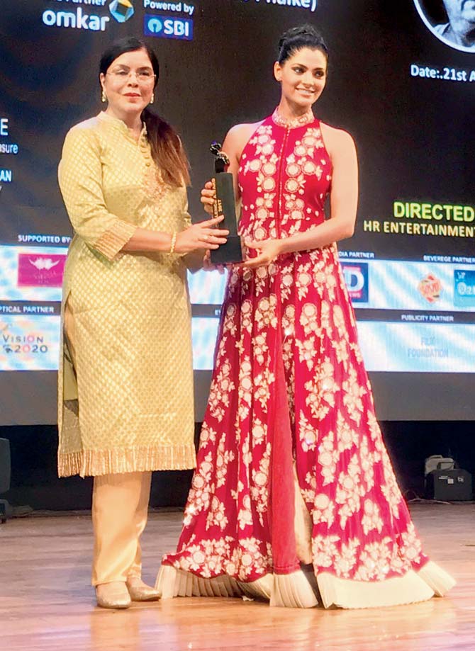 In picture: 'Mirzya' (2016) actress Saiyami Kher was conferred the Best Debut title at the Dadasaheb Phalke Excellence Awards. The youngster received the award from the legendary actress, Zeenat Aman. A thrilled Saiyami told mid-day, '[Aman's films] Yaadon Ki Baraat and Hare Rama Hare Krishna are my favourite films from the '70s. No party is complete without dancing to Dum Maro Dum. It was surreal to receive the honour from her.'