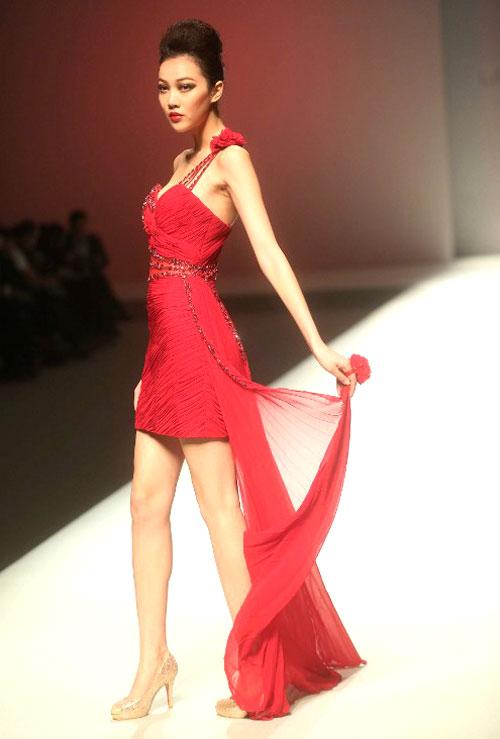 A model parades a creation from the Lacharri Collection during the China Fashion Week in Beijing on October 26, 2013. China Fashion Week runs from October 25 to November 1