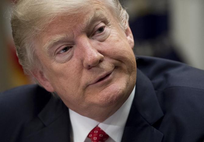 Donald Trump was spotted speaking during a meeting with county sheriffs in the Roosevelt Room of the White House in Washington, DC, February 7, 2017