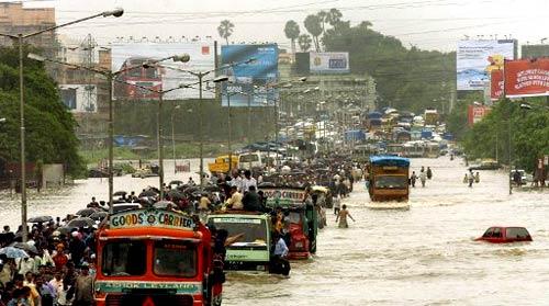 Many cars, motorbikes, and scooters were submerged during the July 26, 2005 floods in Mumbai.