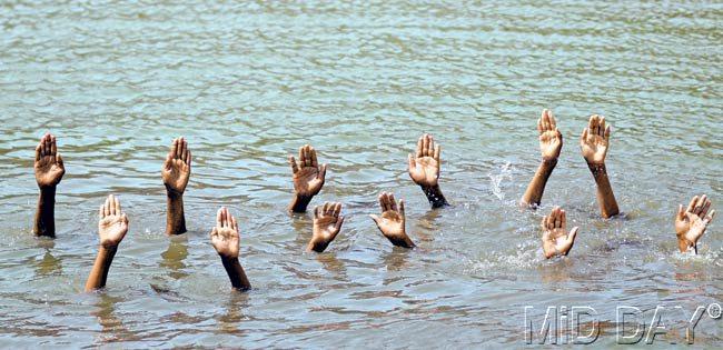 #12 May 16, 2014  DROWNED OUT: The Congress party symbol of the hand seemed to be submerged just like the parties hopes as the results of the elections were rolling out this year. Pic/BIPIN KOKATE