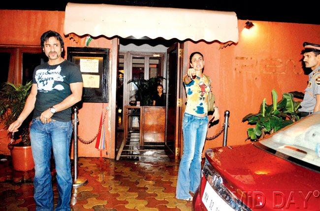 #18 September 23, 2007  WE HAVE EYES EVERYWHERE: Stop, Bebo seems to tell the photographer, when Saif Ali Khan and Kareena were spotted coming out of a Bandra hotspot. Too late, Bebo, weu2019re as quick as a flash. Pic/NIMESH DAVE