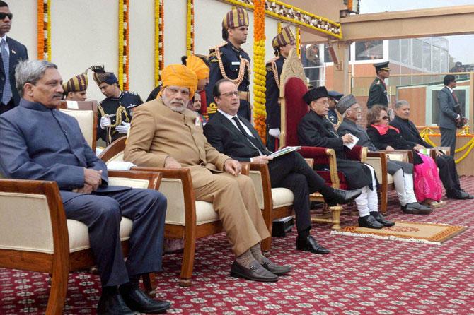 President Pranab Mukherjee and Chief Guest of the Republic Day Celebrations French President Francois Hollande,  Vice President Hamid Ansari, Prime Minister Narendra Modi and Defence Minister Manohar Parrikar at the 67th Republic Day parade at Rajpath in New Delhi on Tuesday. PTI Photo
