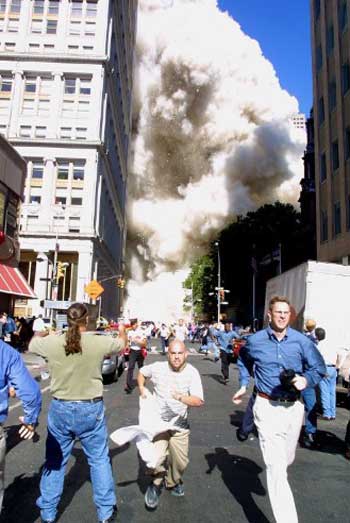 Pedestrians run from the scene as one of the World Trade Center Towers collapses on September 11, 2001, in New York following a terrorist plane crash on the twin towers. The all-out war on terrorism unleashed by Washington after the attacks marked a turning point in US-Arab relations and nowhere more so than in once top ally Saudi Arabia. With 15 of the 19 suicide hijackers carrying Saudi nationality and mastermind Osama bin Laden being the scion of a leading Saudi family, the desert kingdom and world oil kingpin, suddenly found itself on the frontline of the war on terror prosecuted by US President George W. Bush. Pic/AFP