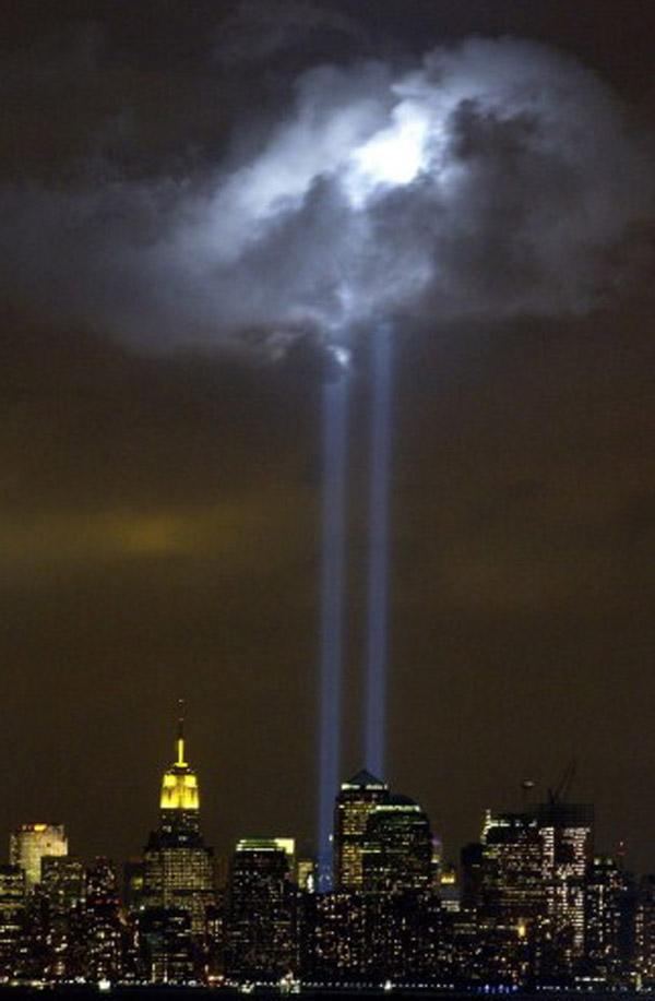 This US Coast Guard handout photo received on September 9, shows a test of the Tribute in Light Memorial as it illuminates a passing cloud above lower Manhattan, just before the third anniversary of the attacks of September 11. Pic/AFP