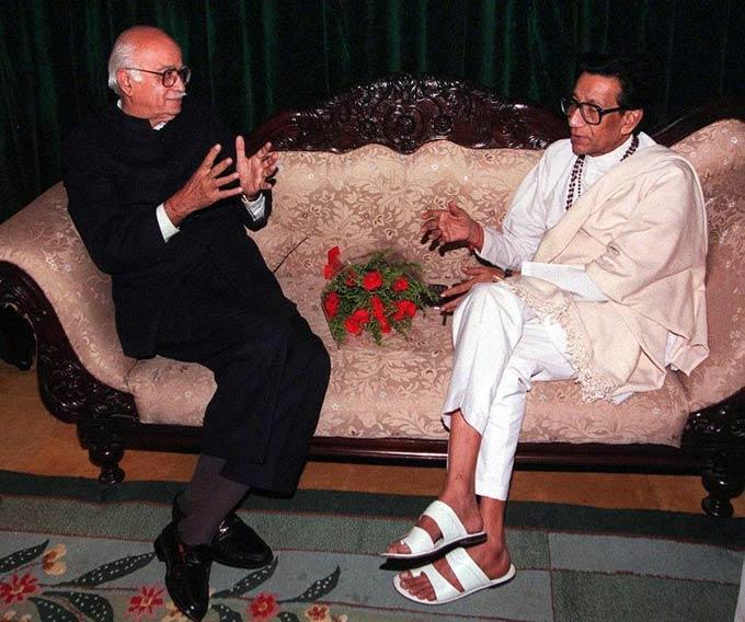 Bal Thackeray sits at an emergency meeting with Indian Home Minister L. K. Advani January 21, 1999 in Mumbai. Thackeray then made the decision to suspend his party's violent campaign to disrupt Pakistan's cricket tour of India just hours before the Pakistan tourists were to land in New Delhi, following the emergency meeting with Advani