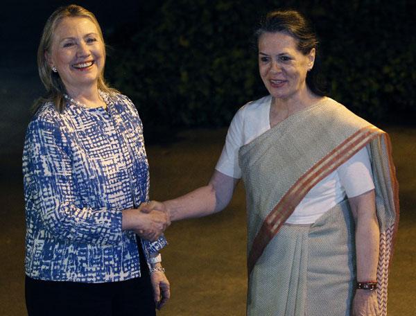 Then US Secretary of State, Hillary Clinton (L) on a three-day tour to India meets UPA Chairperson Sonia Gandhi in New Delhi on May 7, 2012.