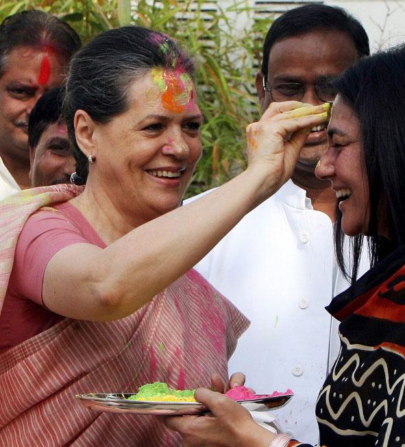Sonia Gandhi celebrates Holi with party supporters in New Delhi on March 22, 2008.