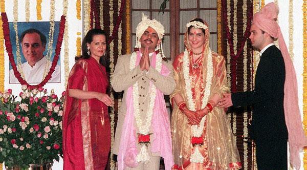 On the day of her daughter's wedding, Sonia Gandhi with newly wed Priyanka Gandhi and Robert Vadra on 18 February 1997 at 10 Jan Path. Priyanka wore a south Indian temple sari, which belonged to her grandmother Indira Gandhi. Also seen is Rahul Gandhi (R).