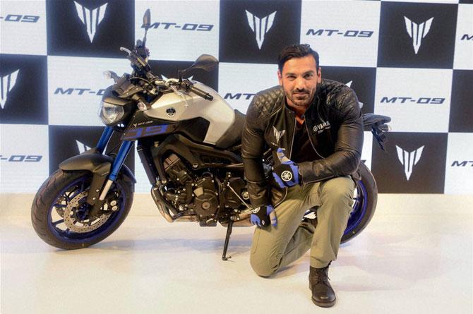 Actor and Yamaha Motor brand ambassador John Abraham during launch of a new Yamaha motorcycle at Auto Expo 2016 in Greater Noida on Thursday. Pic/PTI