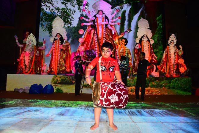 Swastik is seen playing the dhak at Mumbai's Tulip star hotel during Durga Puja. Pic/Atul Kamble