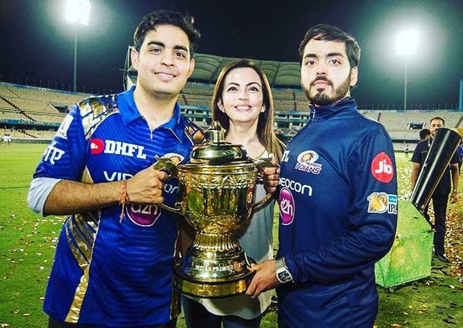 Just before his 21st birthday, Anant Ambani was able to achieve the unthinkable. He reached a weight of 100 kgs and ended up weighing less than the weight he lost In picture: Anant with brother Akash and mother Nita Ambani
