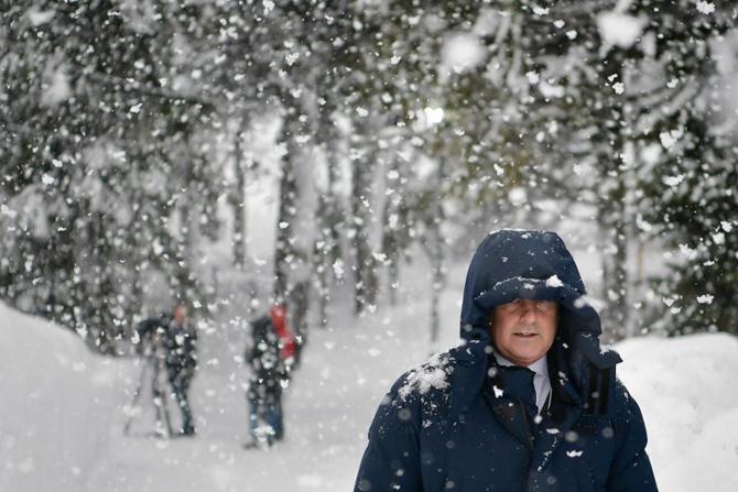 A man walks through heavy snow fall towards the Congress Centre in the resort town of Davos, ahead of the World Economic Forum. Pic/AFP A man walks through heavy snow fall towards the Congress Centre in the resort town of Davos, ahead of the World Economic Forum. Pic/AFP