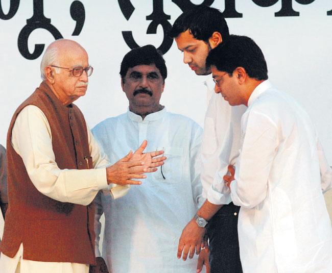 The accident happened at 6 am when Gopinath Munde was travelling in his car in Delhi with a driver and his secretary just a week after taking oath as a Union minister. Gopinath Munde was on his way to the airport to go to Maharashtra  In picture: L.K. Advani, Gopinath Munde, Rahul Mahajan and Raj Thackeray during a condolence meeting for Pramod Mahajan at King George High School in Dadar