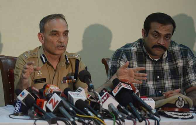 A cadre of the 1988 batch and an alumnus of St Xavier`s College, Roy served in various crucial posts, including SP Nashik (rural), SP Ahmednagar, DCP Economic Offences Wing, DCP Traffic, DCP zone I, and Nashik police commissioner, where he tackled the Khairlanji massacre case.  In Pictures: The Indian Police Commissioner of Mumbai, Satyapal Singh (L), speaks as Joint Commissioner of Police (crime) Himanshu Roy watches during a news conference in Mumbai on August on August 26, 2013 to brief the press about a breakthrough in the Shakti Mills rape case. Pic/AFP