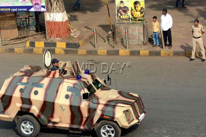 A poster of the recently released Bollywood film is seen in the background as the Republic Day parade is underway in Shivaji Park in Mumbai. Pic/ Sayyed Sameer Abedi