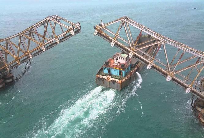 Pamban Bridge is the second longest sea bridge in India at a length of about 2.3 km and also has the distinction of being India's first sea bridge. A cantilever bridge on the Palk Strait, it connects Rameswaram on Pamban Island to mainland India.
