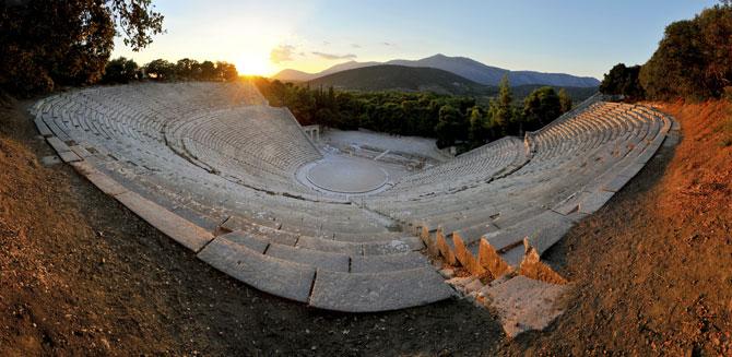 The theatre of Epidaurus in Greece, constructed in the 4th century BC is still one of the most beautiful Greek theatres in the world. The view on a lush landscape behind the scene is an integral part of the theater itself. Known for its exceptional acoustics, actors on stage can be perfectly heard by all 14,000 spectators, regardless of their seating. The theatre of Epidaurus in Greece, constructed in the 4th century BC is still one of the most beautiful Greek theatres in the world. The view on a lush landscape behind the scene is an integral part of the theater itself. Known for its exceptional acoustics, actors on stage can be perfectly heard by all 14,000 spectators, regardless of their seating.