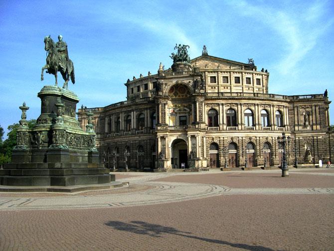 Semperoper, Dresden's first Opera House was built 1838-41. It became famous as one of the most beautiful theatres in Europe despite being destroyed and reconstructed over the Time. The oval shaped building features a large central portal topped by a panther-drawn quadriga with Dionysos, Greek god of the art and his consort Ariadne. Semperoper, Dresden's first Opera House was built 1838-41. It became famous as one of the most beautiful theatres in Europe despite being destroyed and reconstructed over the Time. The oval shaped building features a large central portal topped by a panther-drawn quadriga with Dionysos, Greek god of the art and his consort Ariadne.