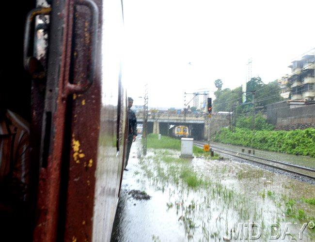 Water-logging on tracks near Sion railway station. Pic/Datta Kumbhar