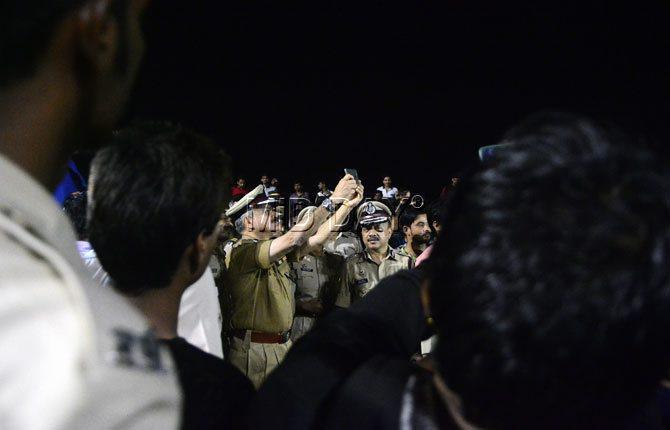 Mumbai Police Commissioners Ahmed Javed takes a selfie with fellow officers