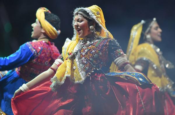 Traditional dancers perform before the arrival Narendra Modi for a community reception September 28, 2014 at Madison Square Garden in New York