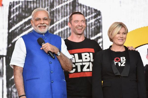 Prime Minister Narendra Modi, Hugh Jackman and Deborra-Lee Furness speak onstage at the 2014 Global Citizen Festival to end extreme poverty by 2030 in Central Park on September 27, 2014 in New York City