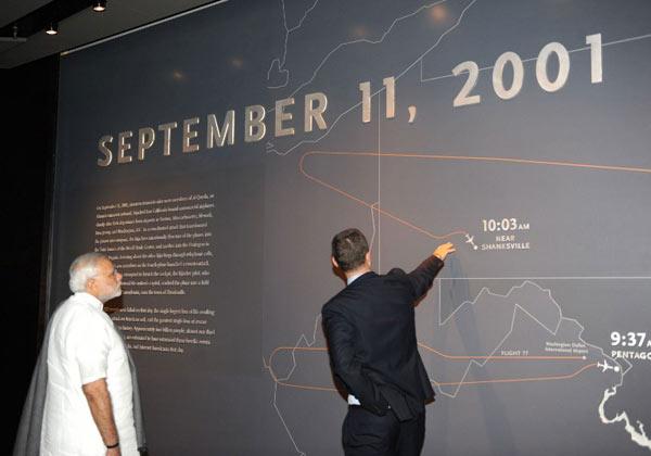 In this photograph released by the Indian Press Information Bureau (PIB), Prime Minister Narendra Modi listens to a briefing at the 9/11 Memorial Museum in New York on September 27, 2014