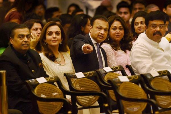 Industrialist Mukesh Ambani and wife Nita along with Anil Ambani and wife Tina. Pic/PTI