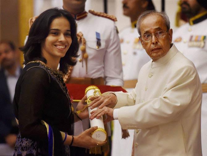 President Pranab Mukherjee presents Padma Vibhushan to badminton star Saina Nehwal. Pic/PTI