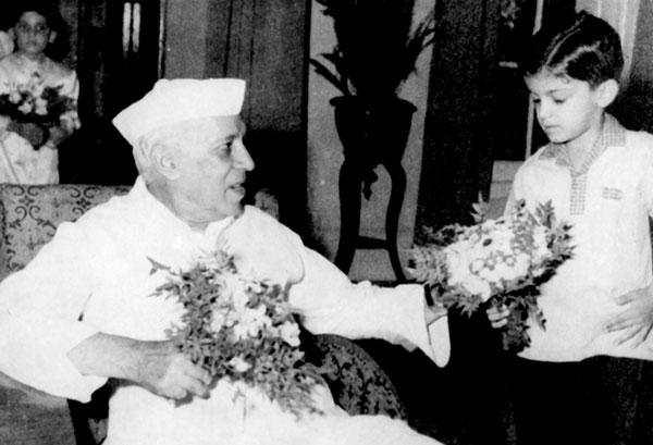 In this rare photo, Pandit Jawaharlal Nehru greets children on his birthday.