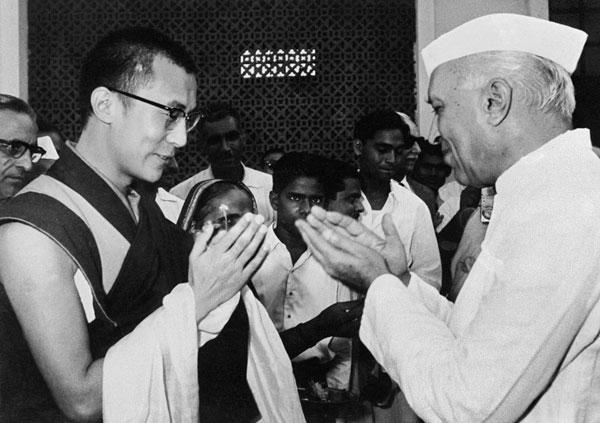 Pandit Jawaharlal Nehru in conversation with Buddhist spiritual leader Dalai Lama.