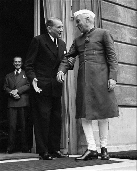 French president Rene Coty welcomes Pandit Jawaharlal Nehru July 17, 1956 at the Elysee Palace in Paris.