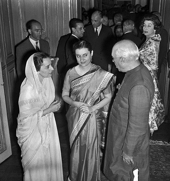 Pandit Jawaharlal Nehru in official visit in France talks with his daughter Indira Gandhi on July 17, 1956 at the Elysee Palace in Paris.