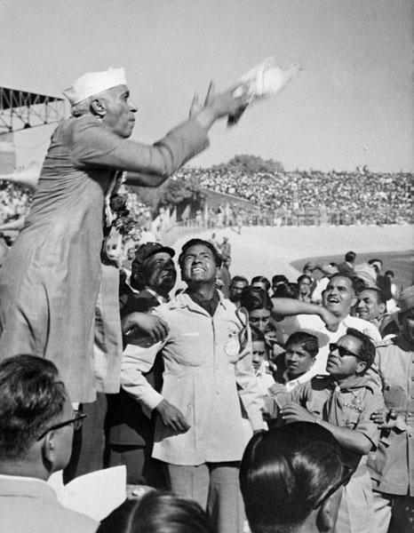 Jawaharlal Nehru launches a dove as a symbol of peace, November 18, 1954 during a huge demonstration held in honour of his 65th anniversary at the New Delhi stadium.