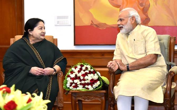 Jayalalithaa also implemented welfare schemes like all-women police stations, women libraries, all-women banks during her tenures and became famous for her series of Amma Canteen, Amma Water, Amma Salt, Amma Medical, Amma Fan, Amma Seeds, Amma Mixi and Amma Grinder In this photograph released by India's Press Information Bureau on June 14, 2016, Jayalalithaa (L) meets Narendra Modi in New Delhi