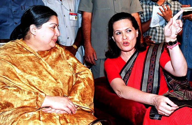 Jayalalithaa was allegedly physically and verbally assaulted by DMK members after which she steeled her resolve to bring the AIADMK back to power. In the 1991 state assembly elections, the party won an overwhelming victory, and Jayalalitha began her first term as chief minister heading a coalition government with Congress In picture: Sonia Gandhi (right), gestures as she speaks to Jayalalithaa during a function in New Delhi, on March 29, 1999      