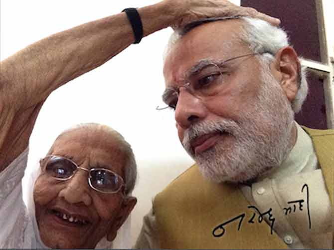 Special mention! Heeraben Modi: Prime Minister Narendra Modi's mother, is 98-years-old and lives in the outskirts of Gandhinagar, Gujarat. Narendra Modi makes it a point to visit his mother once a year to seek her blessings. Pic/ Twitter