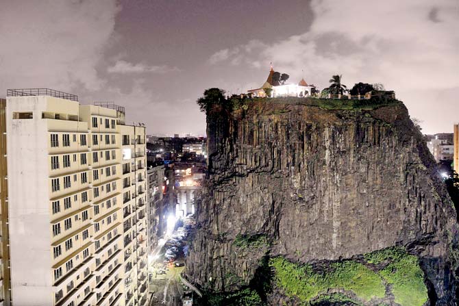 There are two temples, the Gaodevi and Durgamata temples, set in a small garden, are accessed by a steep staircase carved into the rock. The hill offers a panoramic view of suburban Mumbai