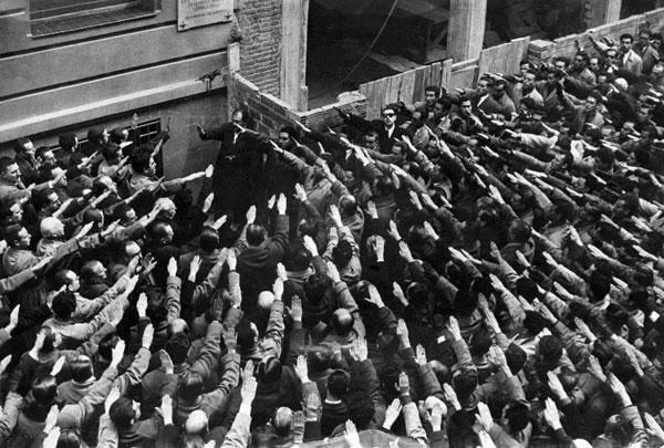 Pro-Franco militants make the fascist salute, on February 11, 1956, to pay tribute to Mathias Montero, killed in this street of Madrid in 1933. Violent unrests with opponents erupted after the ceremony